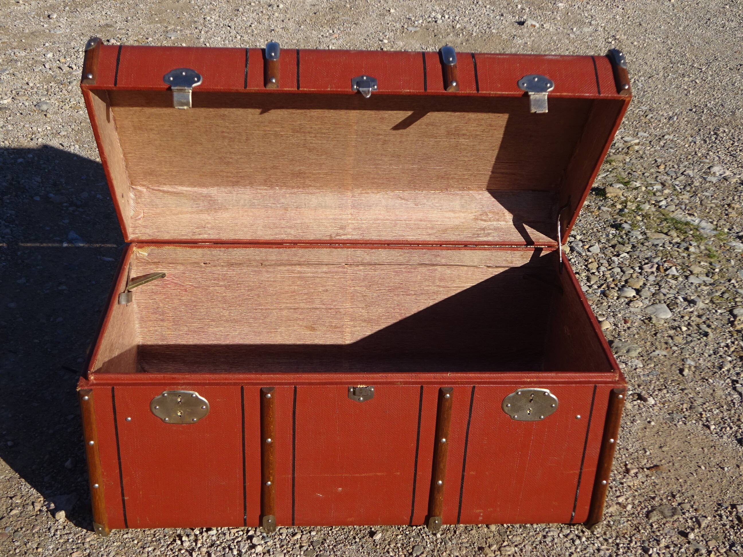 Old curved travel trunk