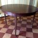 Table ronde en palissandre, extensible