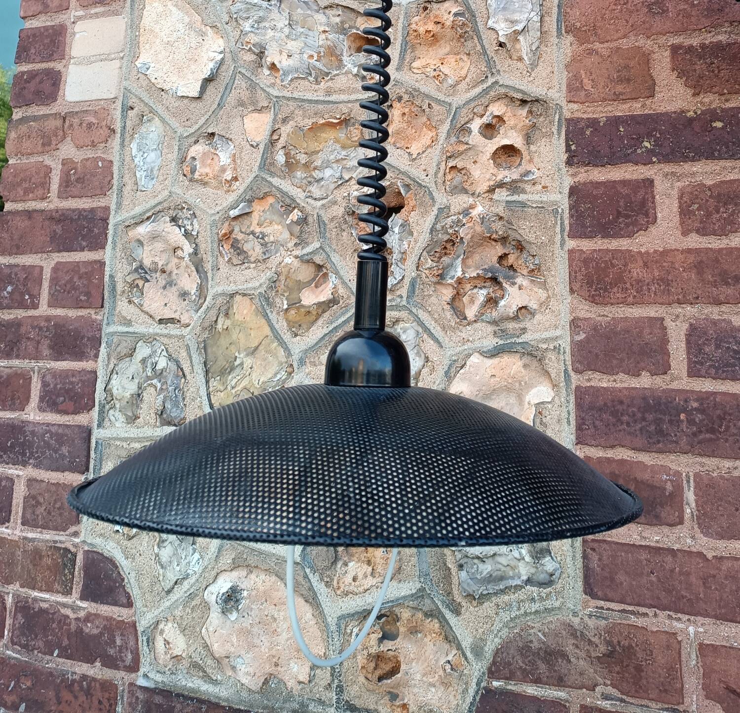 Scandinavian pendant light in perforated sheet metal