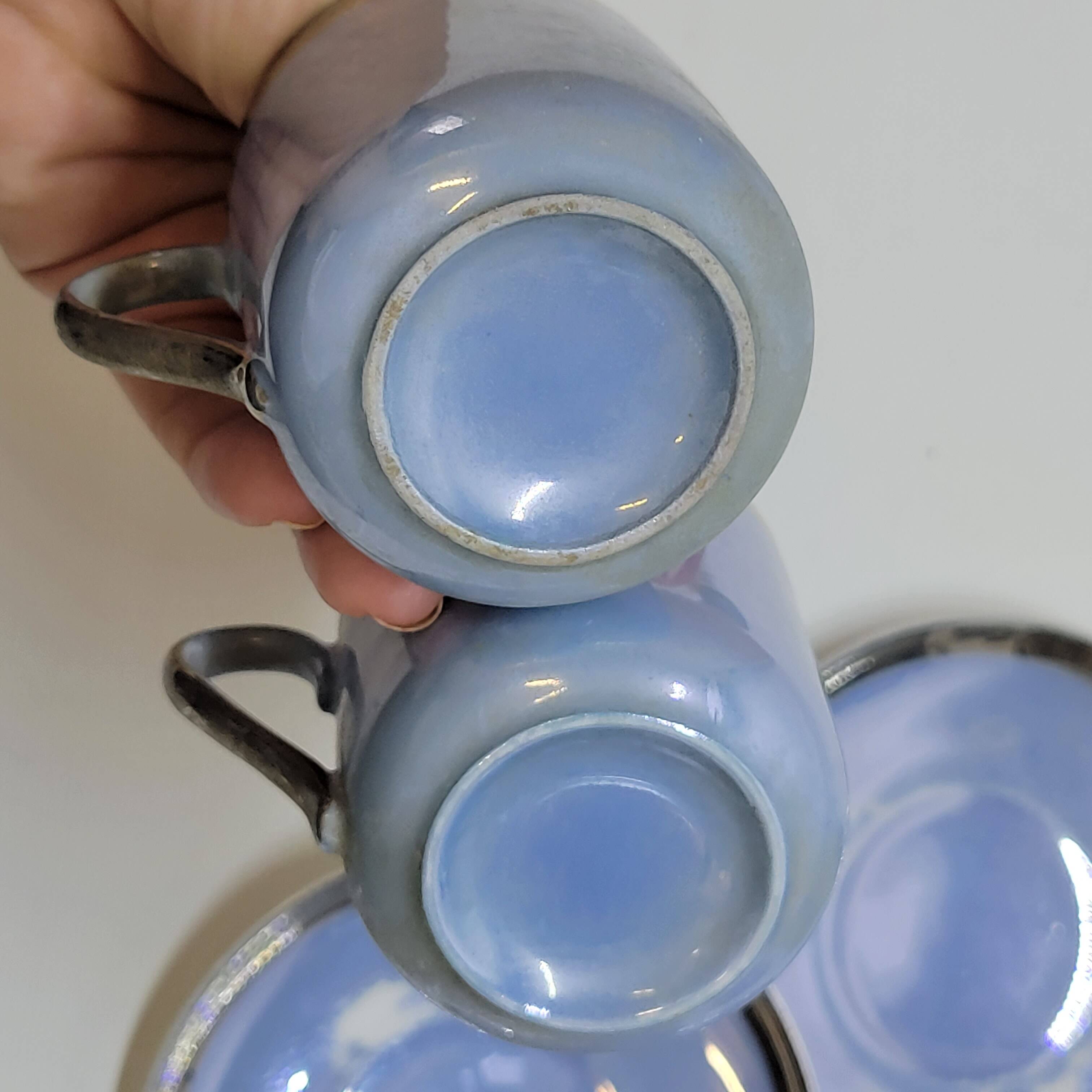 Art deco coffee service in fine iridescent blue porcelain, metal and wood
