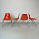 Vintage Eames Herman Miller DSS side chairs in coral orange