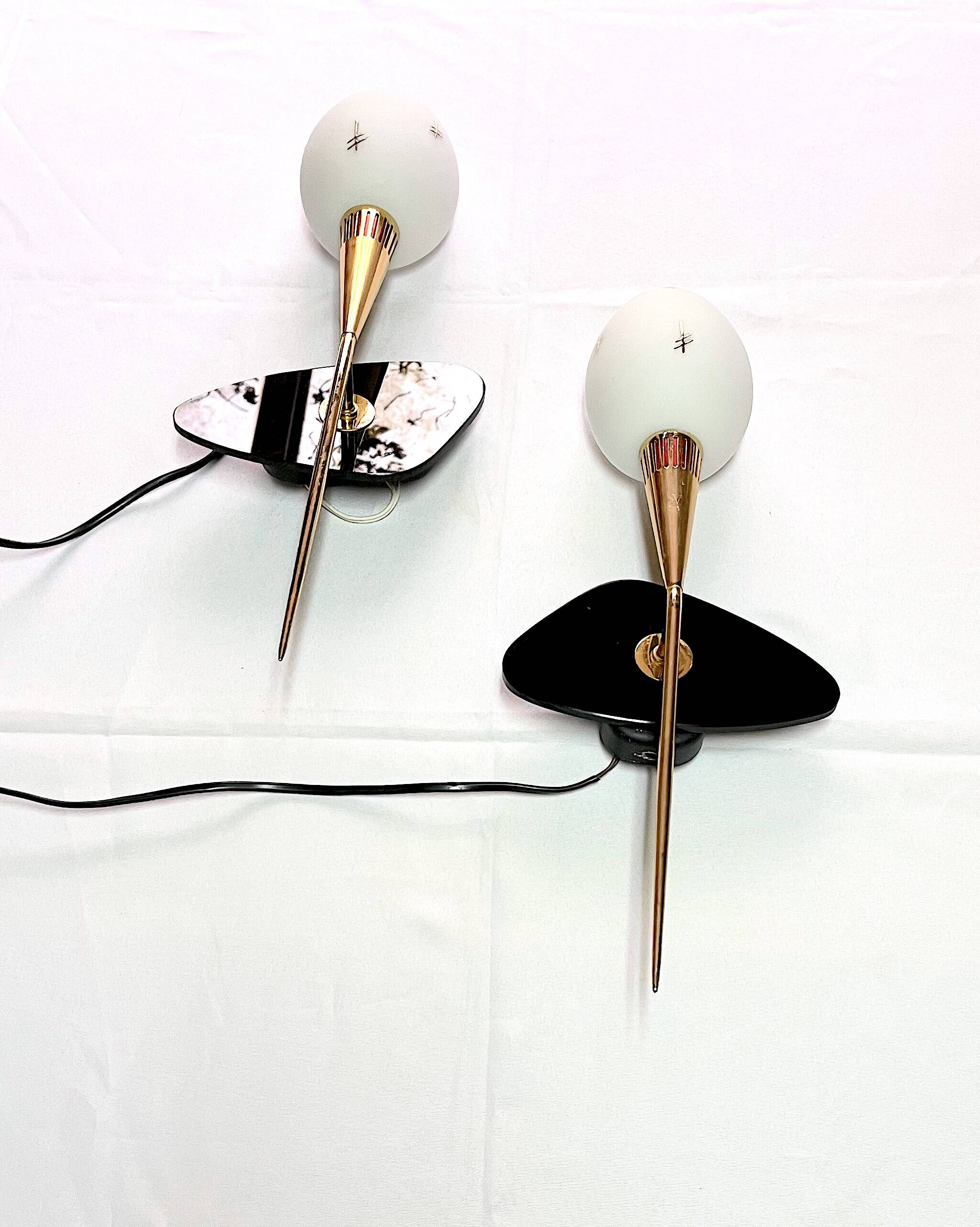 Maison Arlus Pair of brass and black wall sconces, France Mid-Century