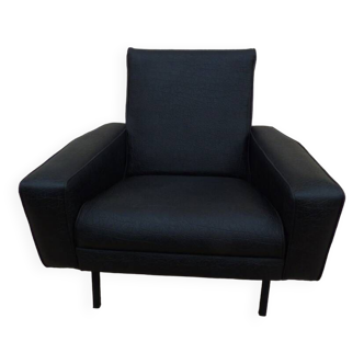 Quality vintage armchair from the 70s in black imitation leather and metal legs