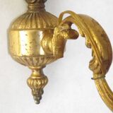 Pair of simple vintage French wall sconces in Art Nouveau bronze with leaf-shaped details.