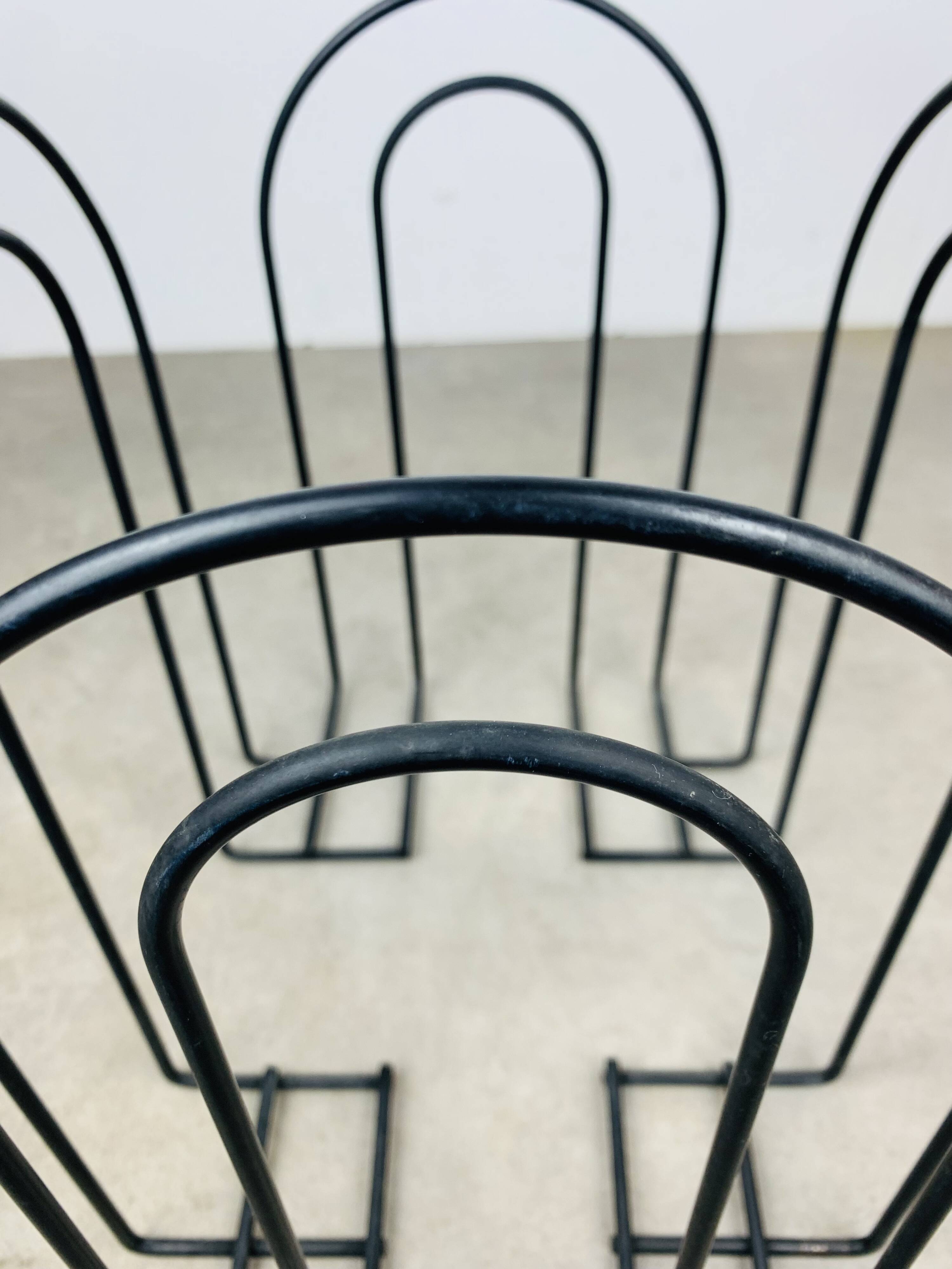 Postmodern metal magazine rack, black, 1980s.