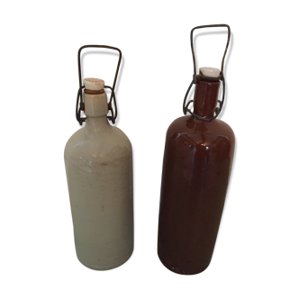 Lot of two glazed sandstone bottles