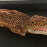 Empty vintage ceramic crocodile pocket