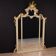 Grand miroir laqué et doré de style Louis XV du 20e siècle.