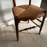 Antique wooden chair with woven straw seat – rustic style