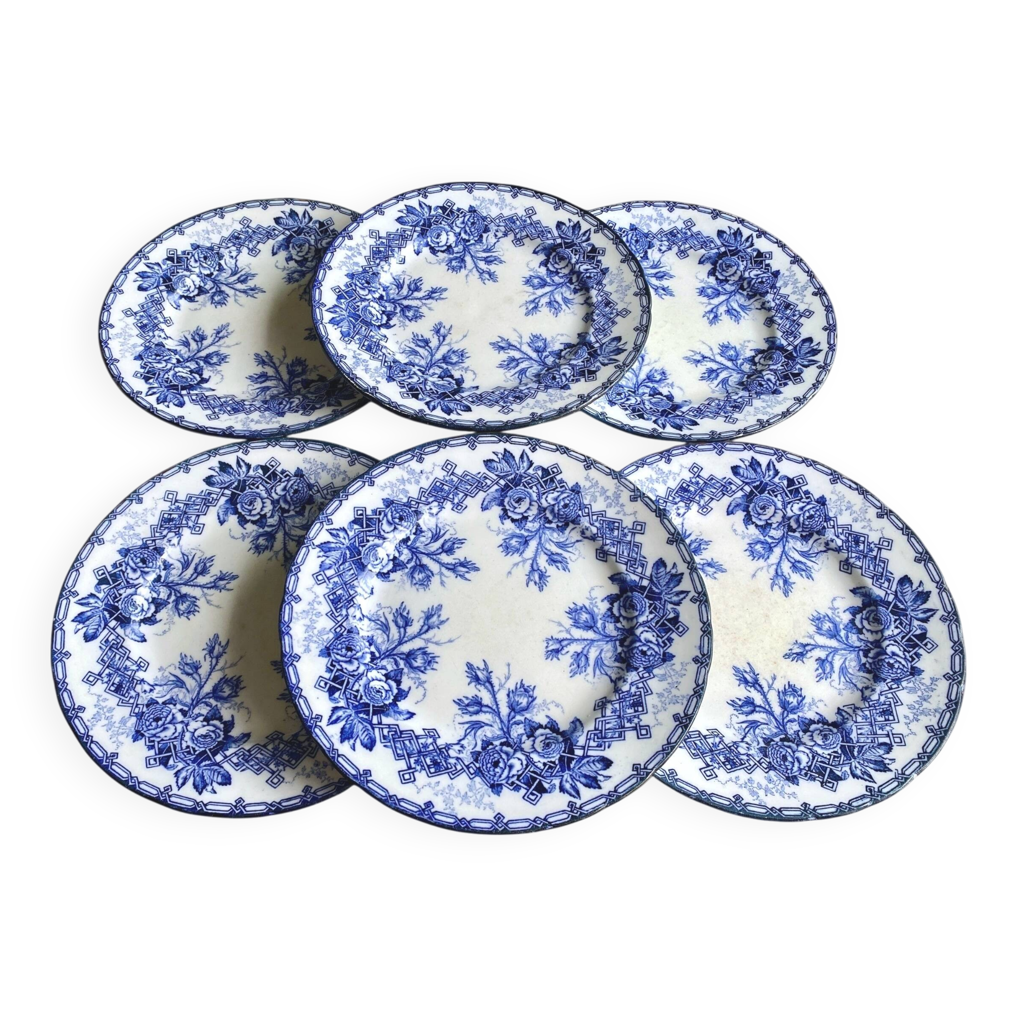 6 flat plates, Creil and Montereau earthenware, late 19th century, Flora decor