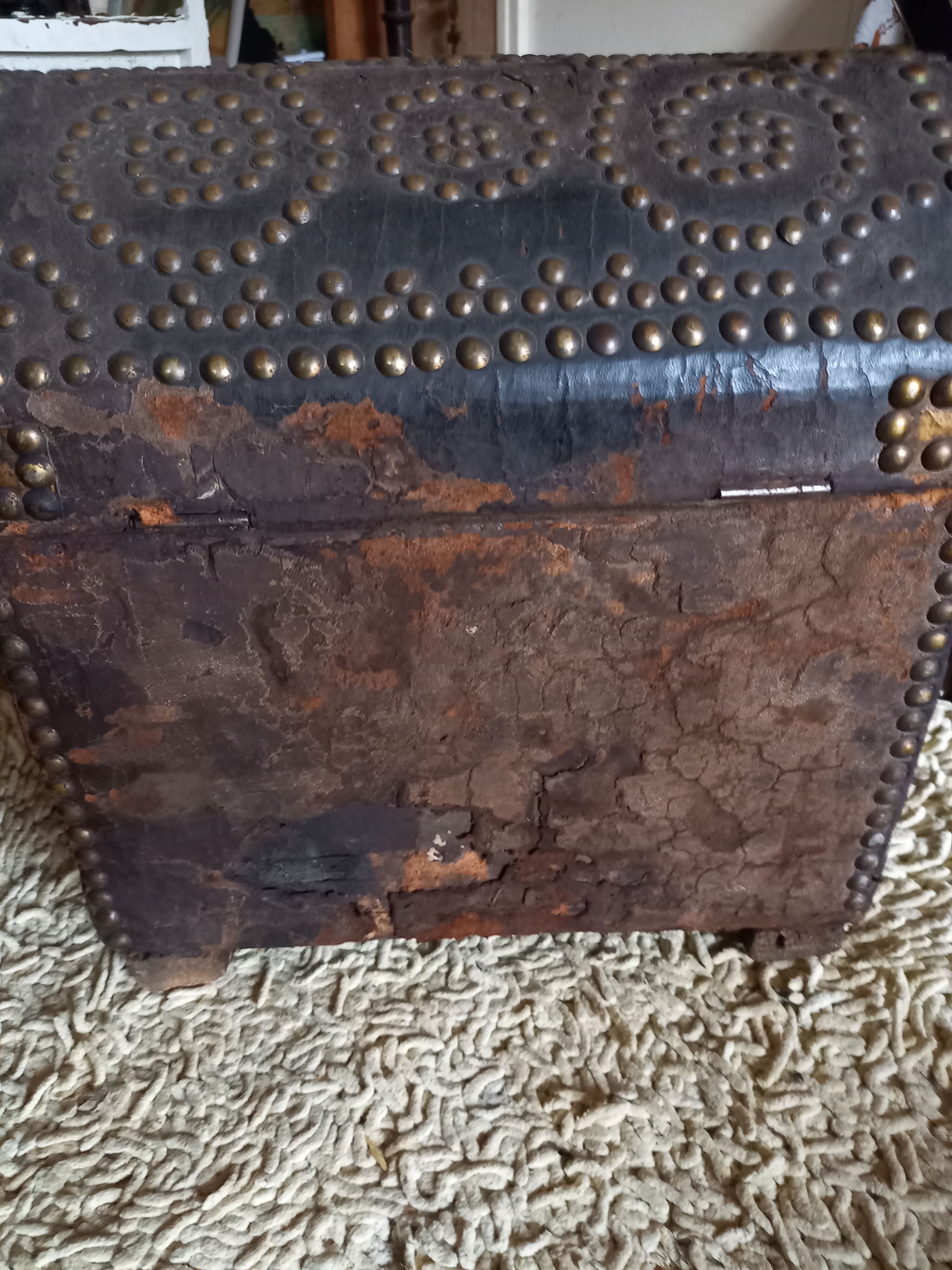 Old chest wood and studded leather