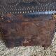 Old chest wood and studded leather