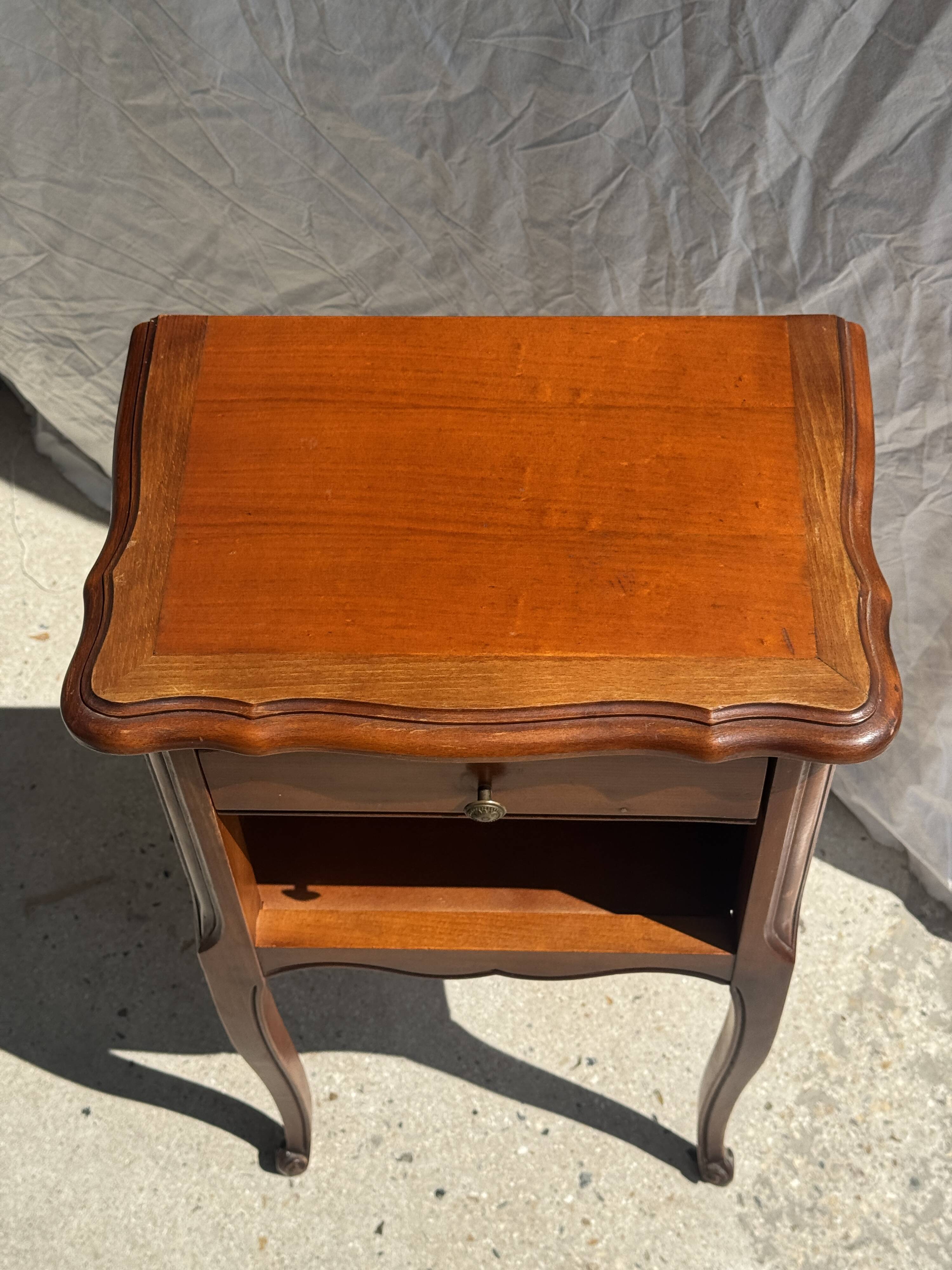 Classic wooden bedside table with drawer