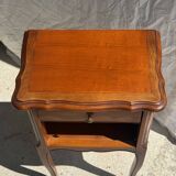 Classic wooden bedside table with drawer