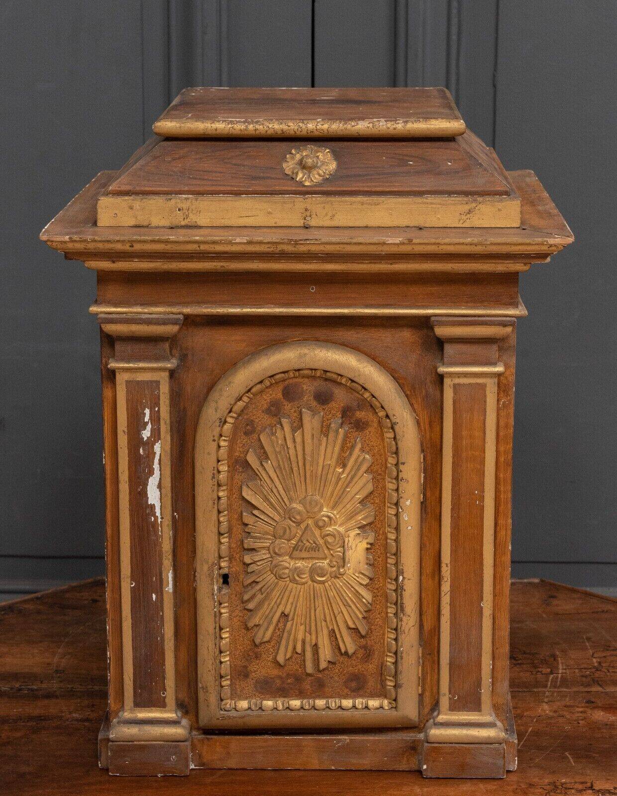 18th century tabernacle decorated with 2 columns and a sun on the facade