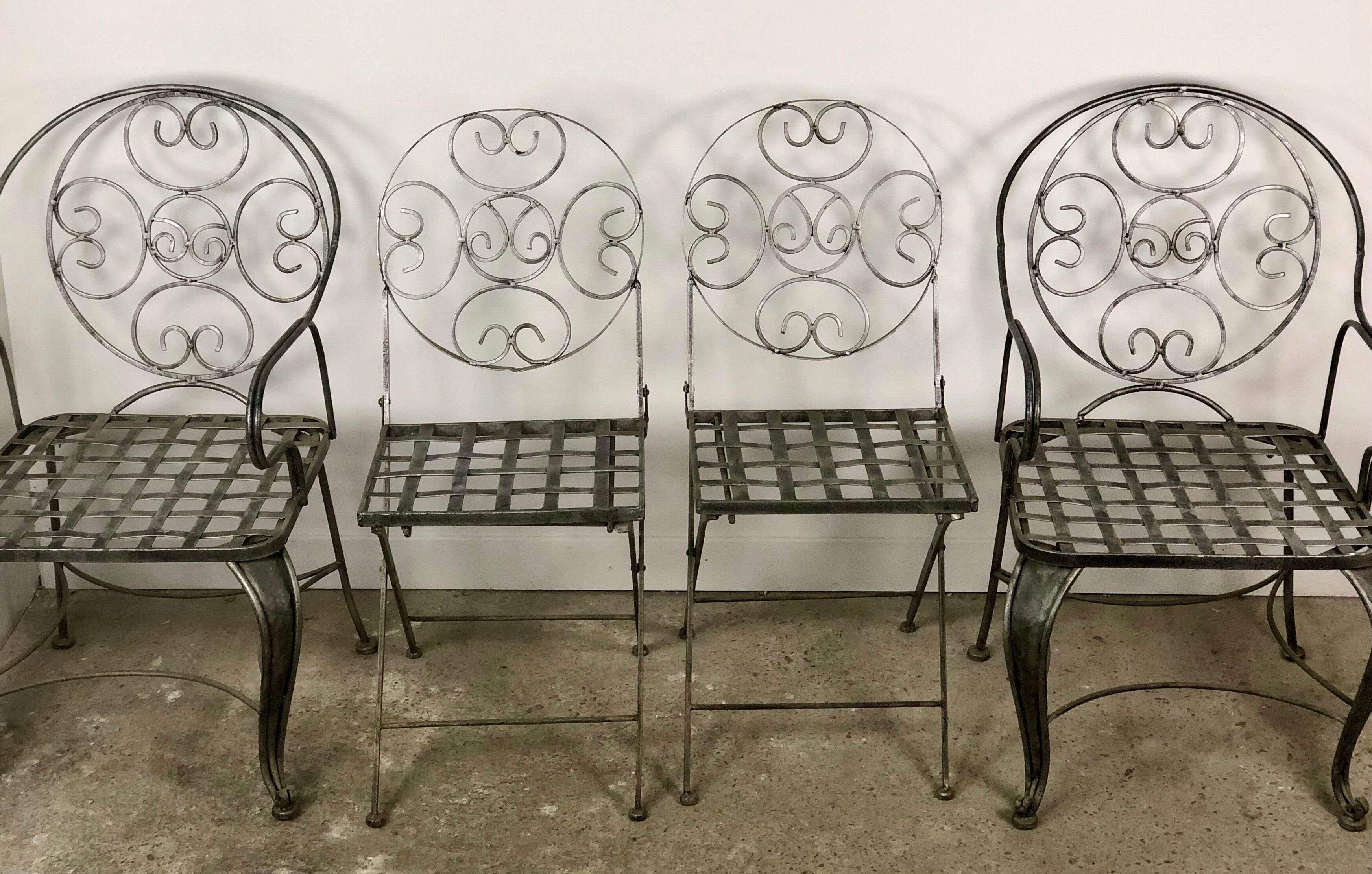 Garden chairs and armchairs (series of 4) vintage 1980 in wrought iron