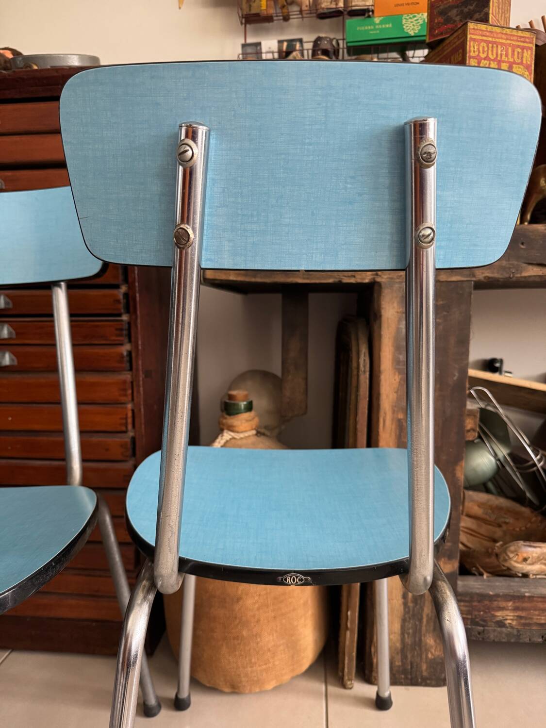 Pair of vintage blue Formica chairs