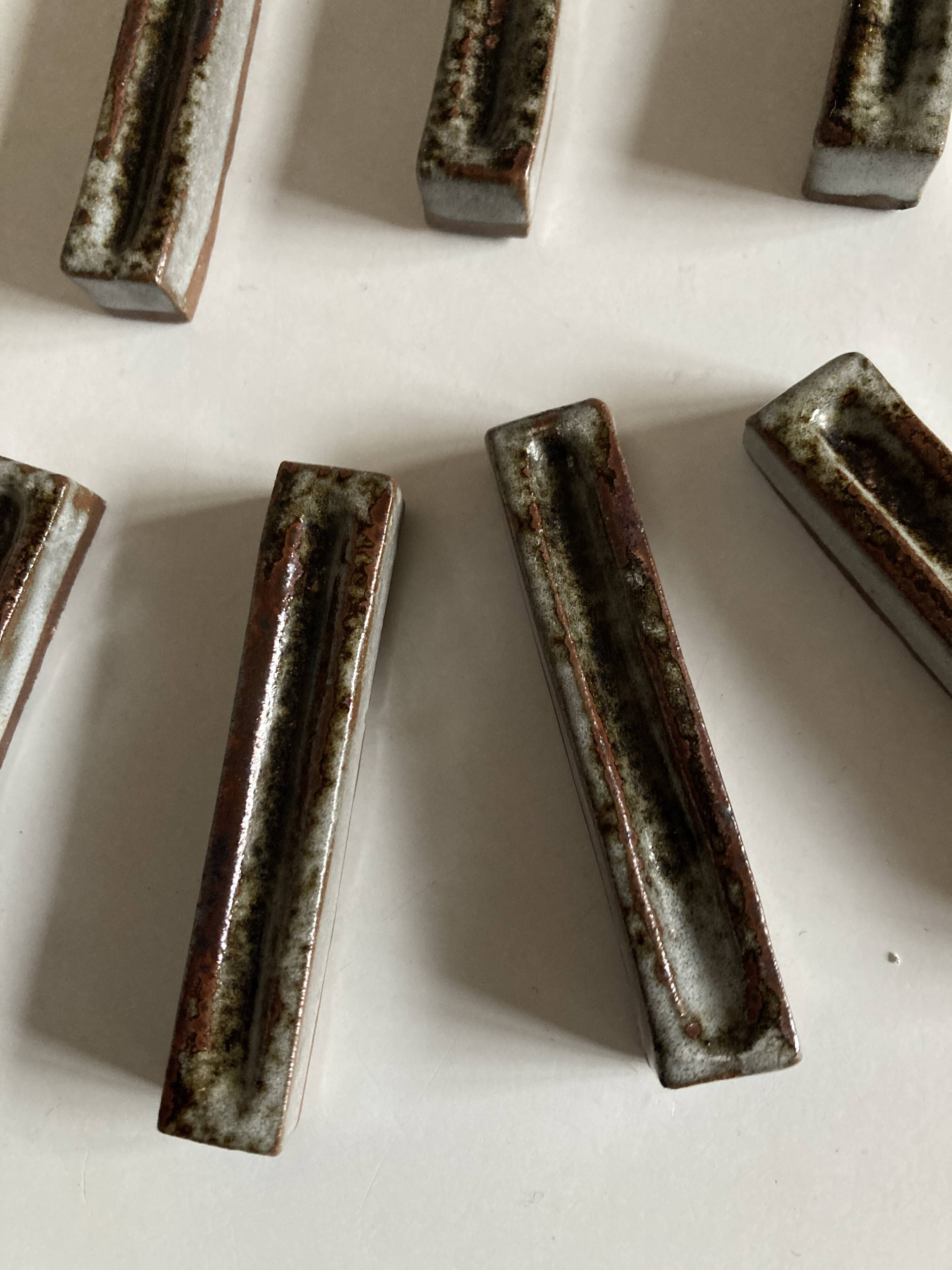 Set of 7 modernist pyrite stoneware potter's knife holders 1970