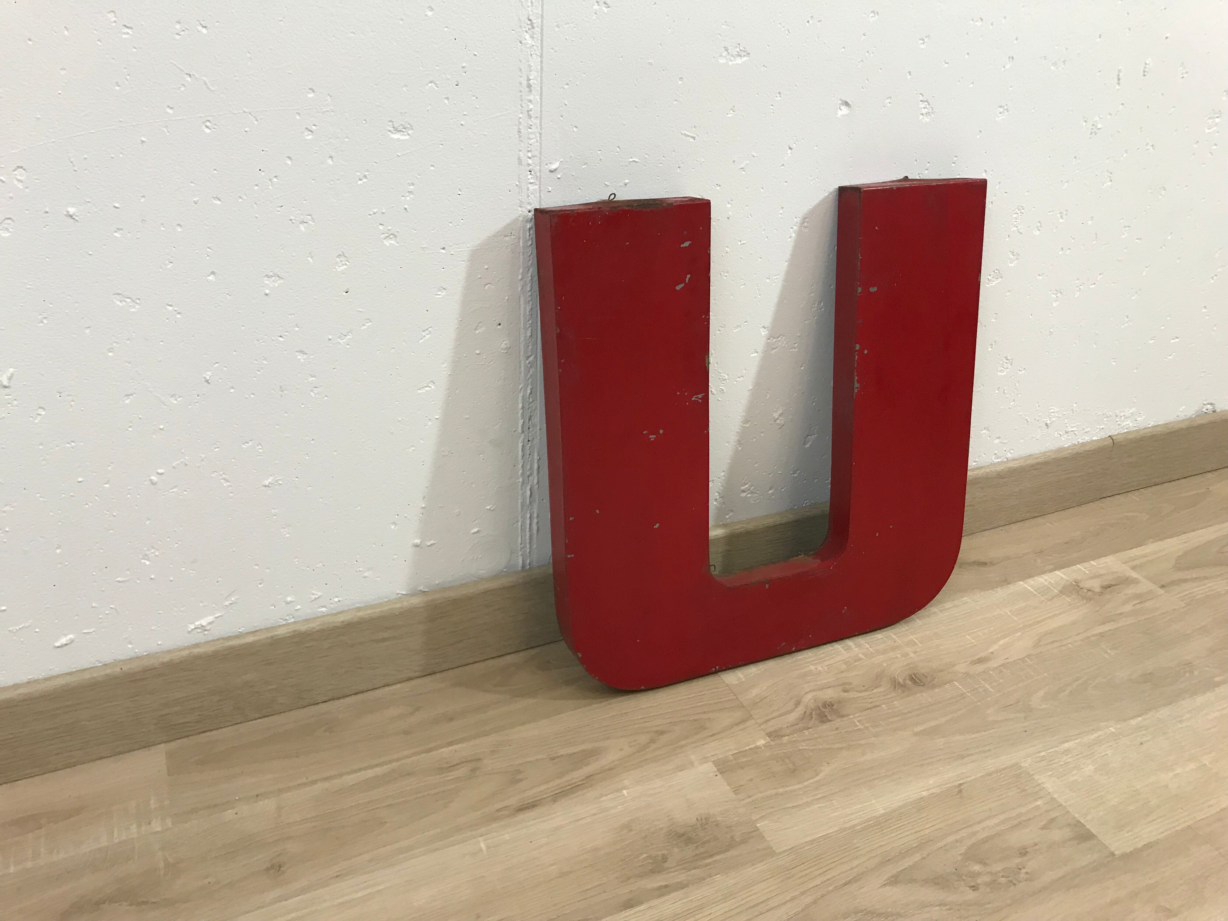 Old metal letter "U"
