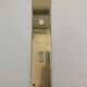 Brass door handle plate with lock entry.