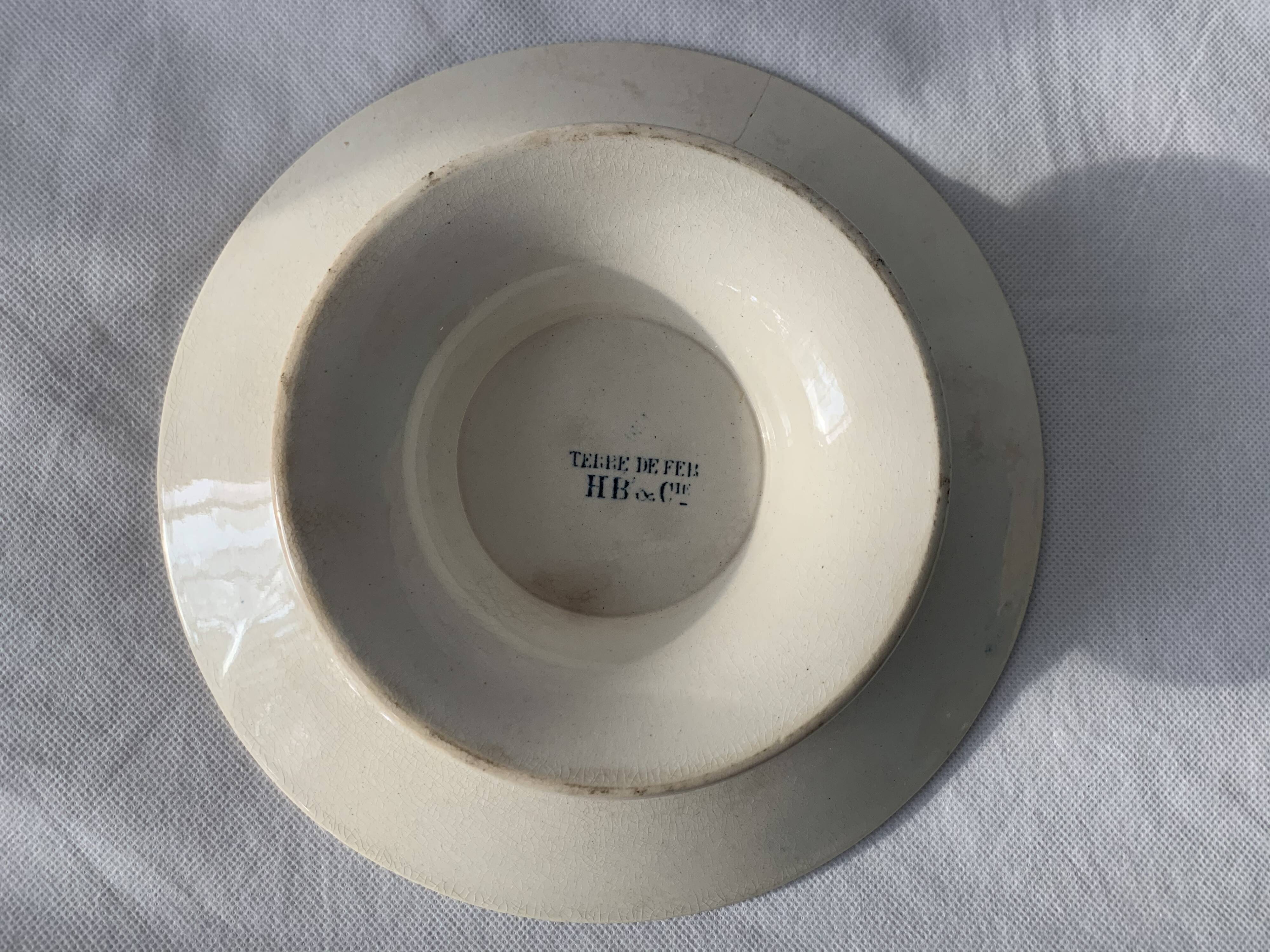 8 plates and an old compoter Terre de Fer HB and Co.