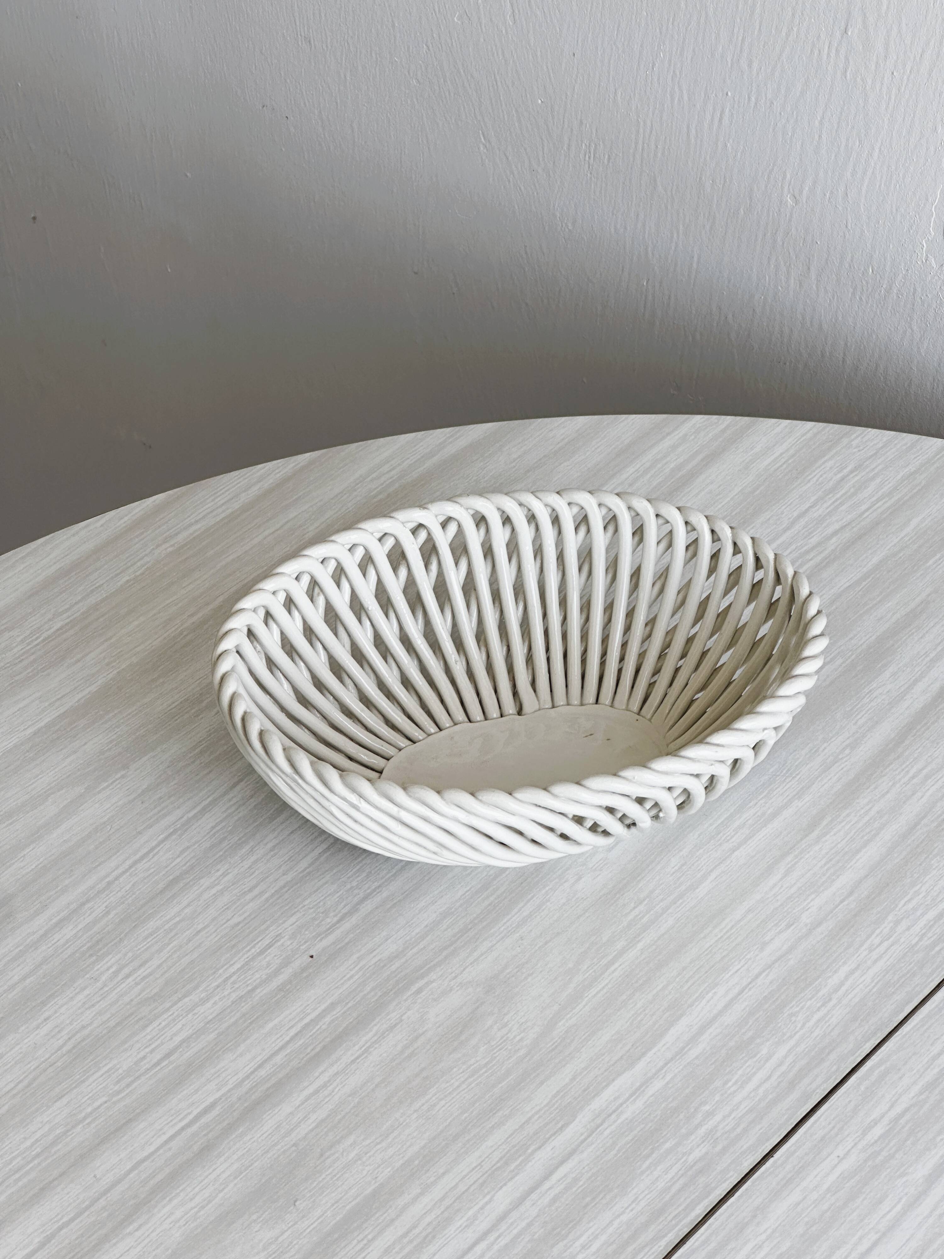 Small white ceramic twisted basket