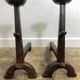Pair of antique cast iron fire dogs, rustic decor, around 1900.