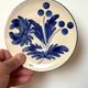 duo of porcelain dessert plates with hand-painted floral decoration