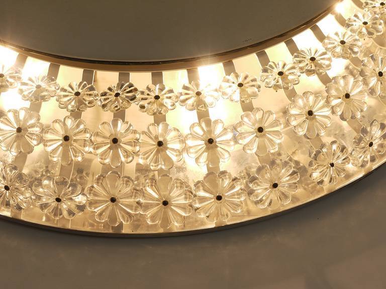 Large round wall mirror with glass flowers by Emil Stejnar, backlit by Nikoll, Austria.