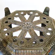 Italian side table with three openwork shelves in patinated metal.