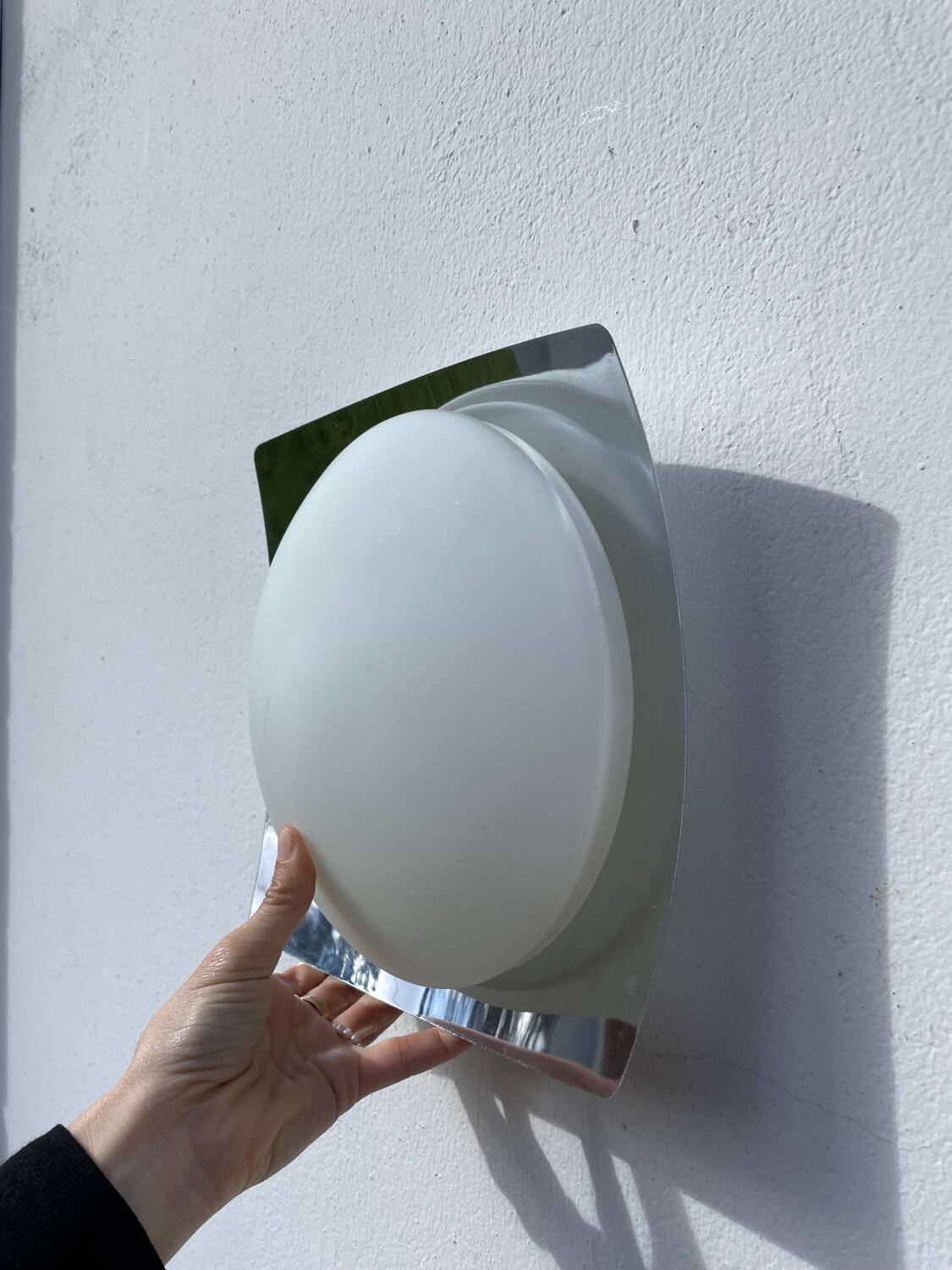 White glass and stainless steel ceiling light