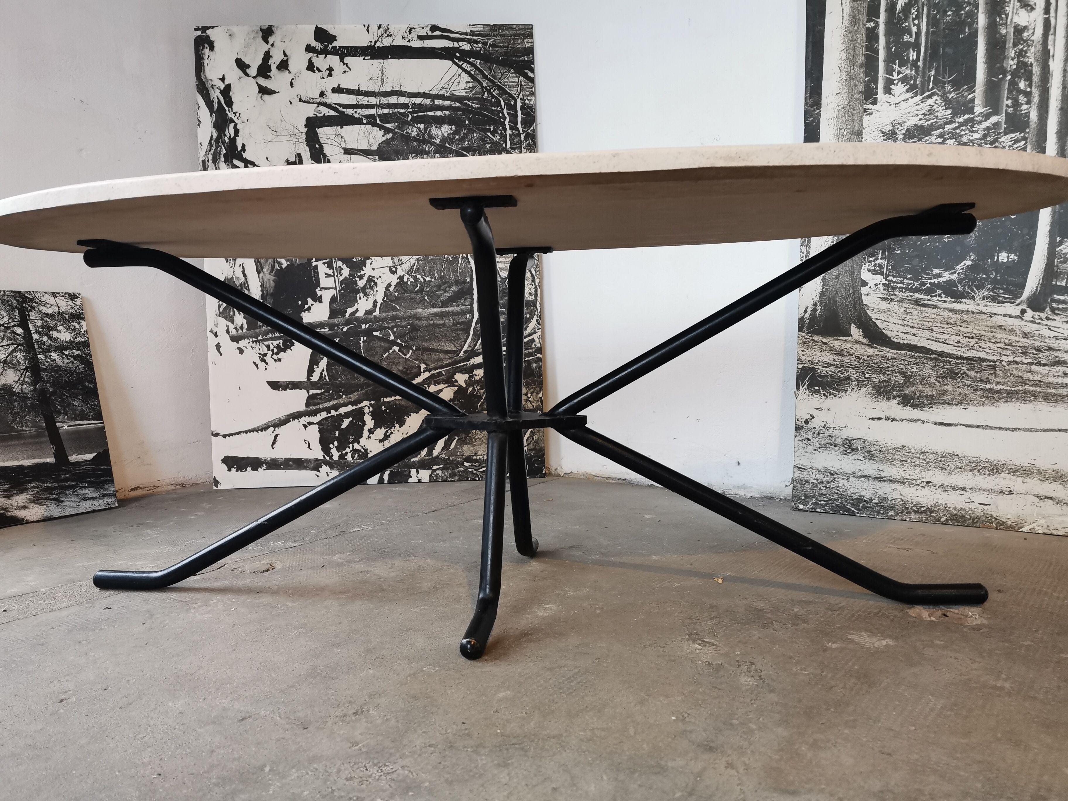 Large oval coffee table in travertine and metal