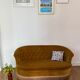 Old gold toad bench