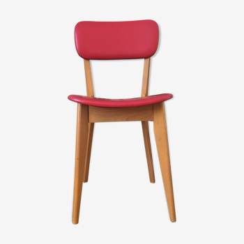 Chaise vintage en bois et skai rouge