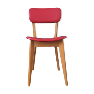 Chaise vintage en bois et skai rouge