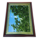 Large wooden and gold mirror
