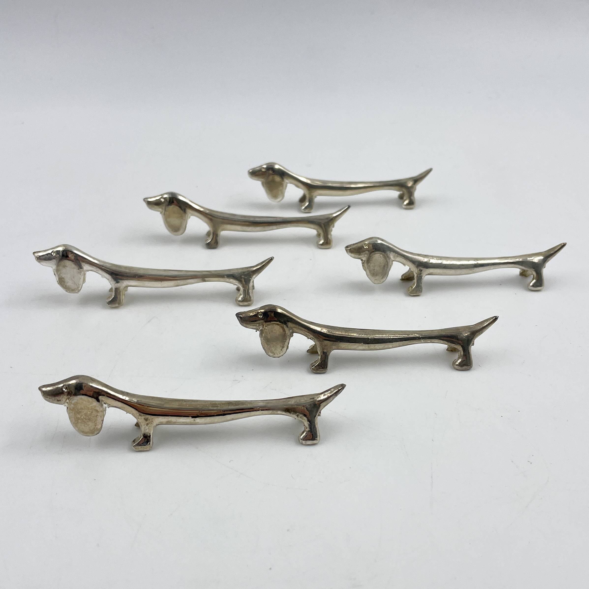 Set of 6 silver metal Dachshund knife holders, 1970s