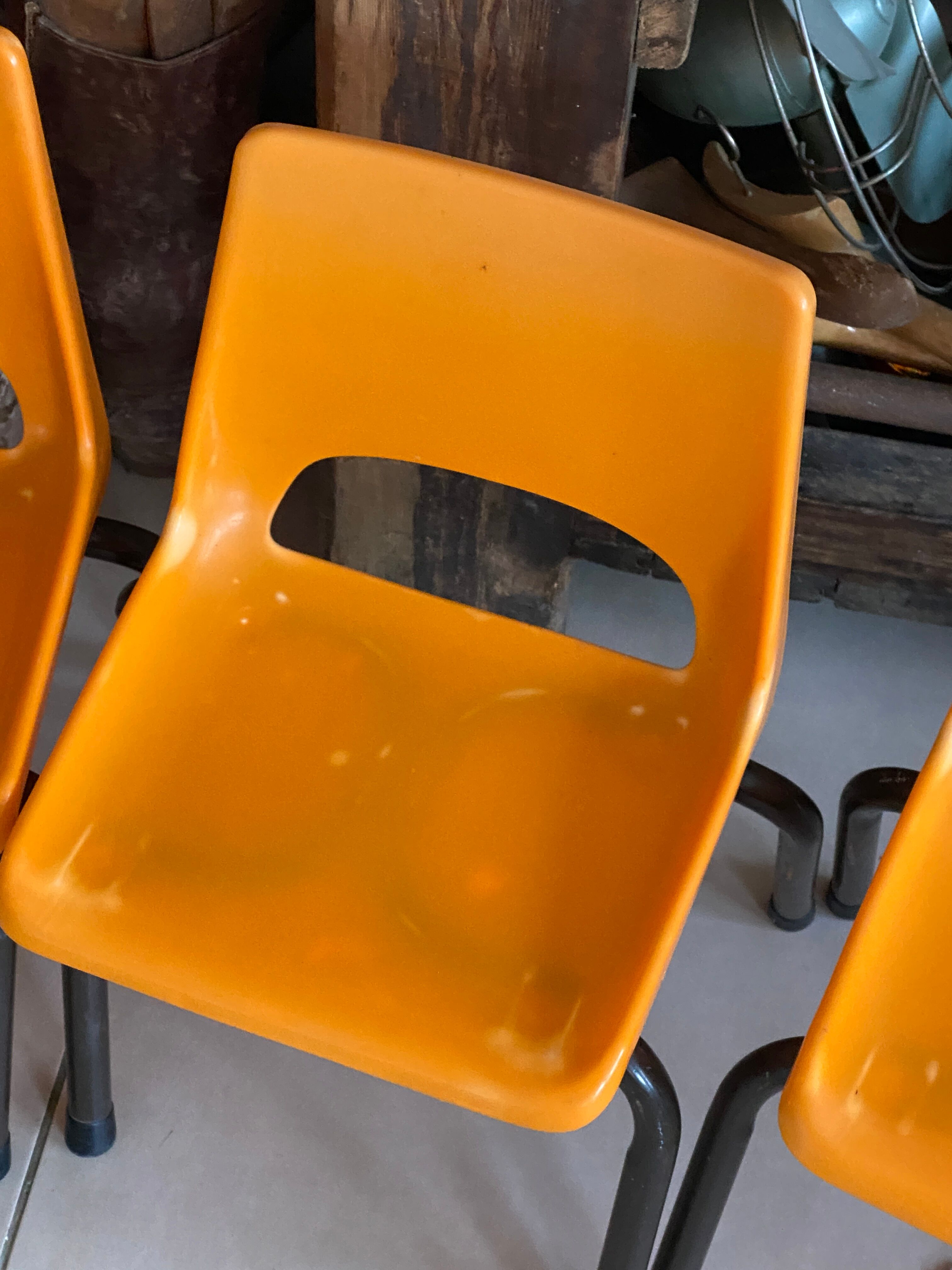 Set of 4 orange school chairs