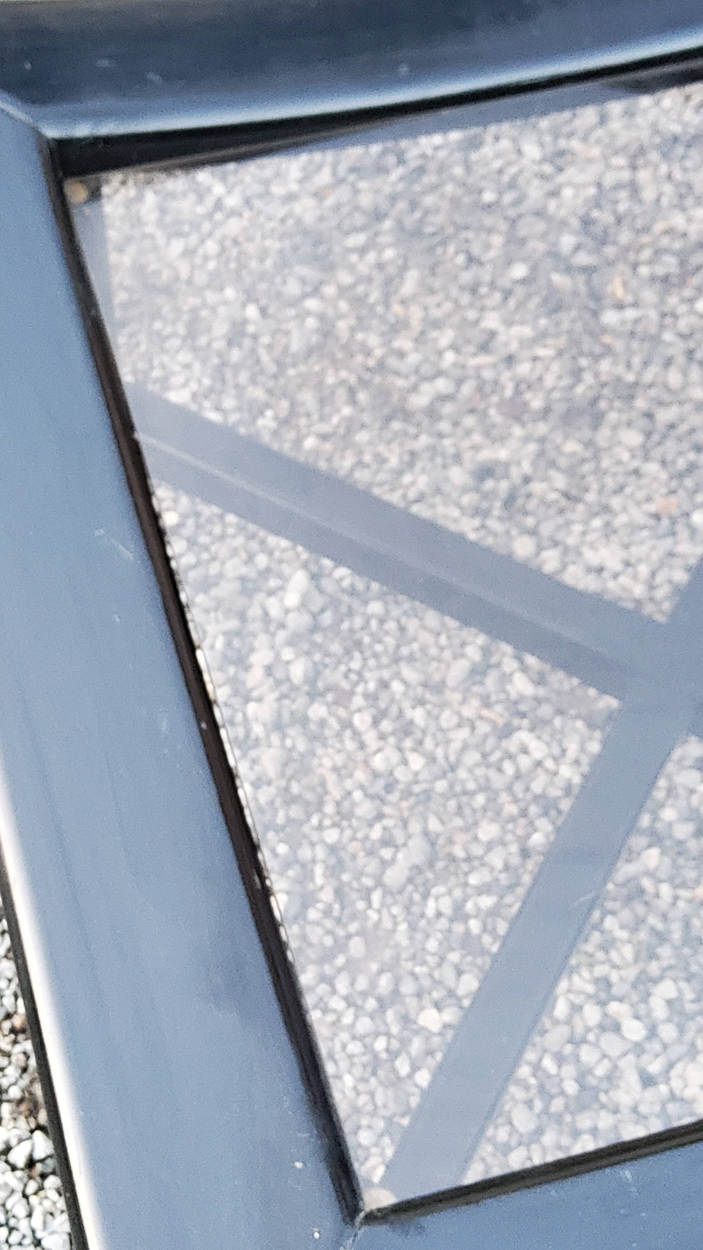 70s design coffee table in black lacquered wood with smoked glass top