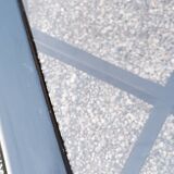 70s design coffee table in black lacquered wood with smoked glass top