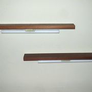 Pairb of Danish teak shelves with wall lights, 1960s