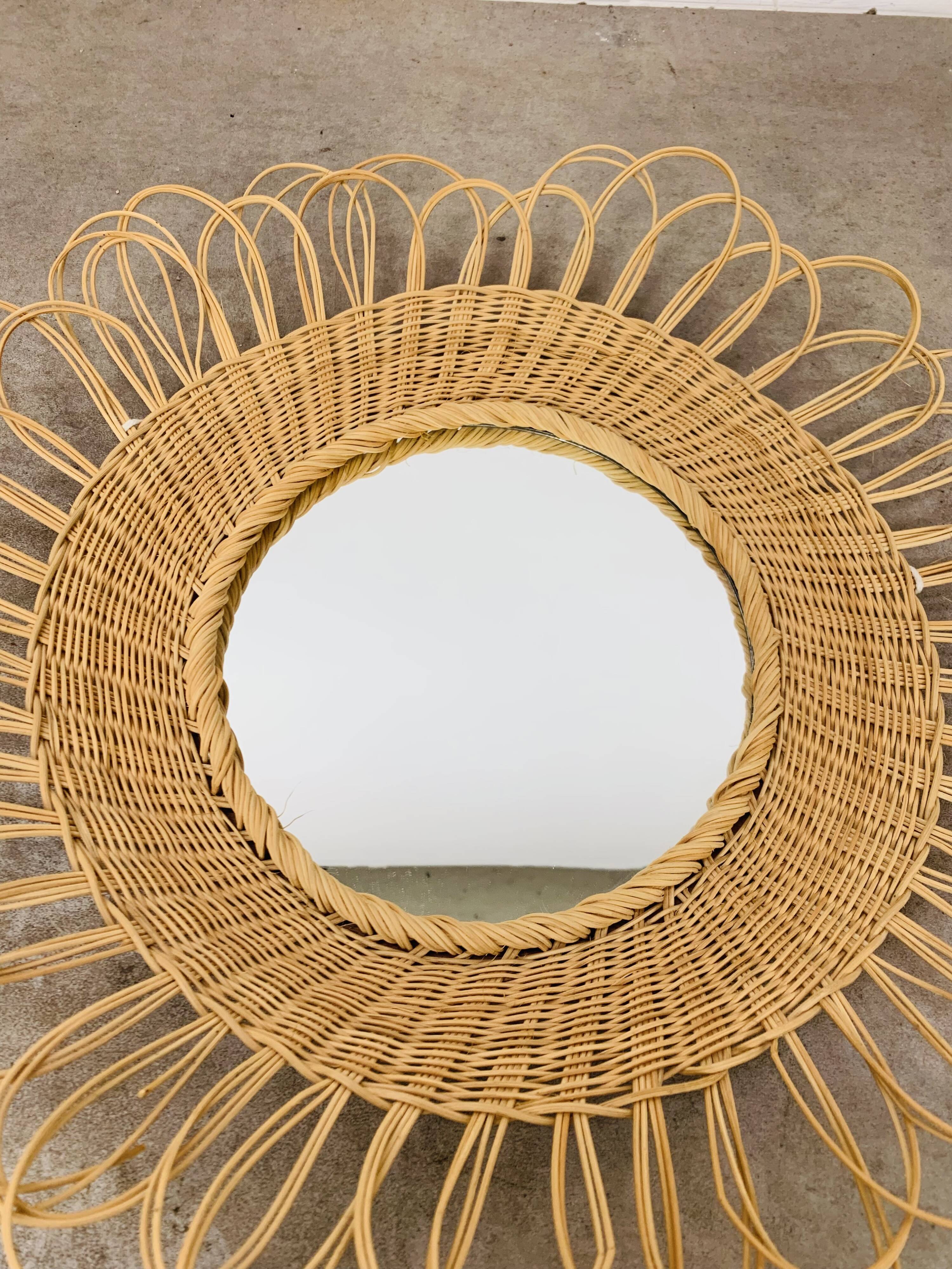 Vintage rattan sun mirror from the 60s