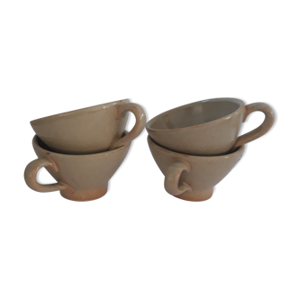 Suite de 4 tasses en grès