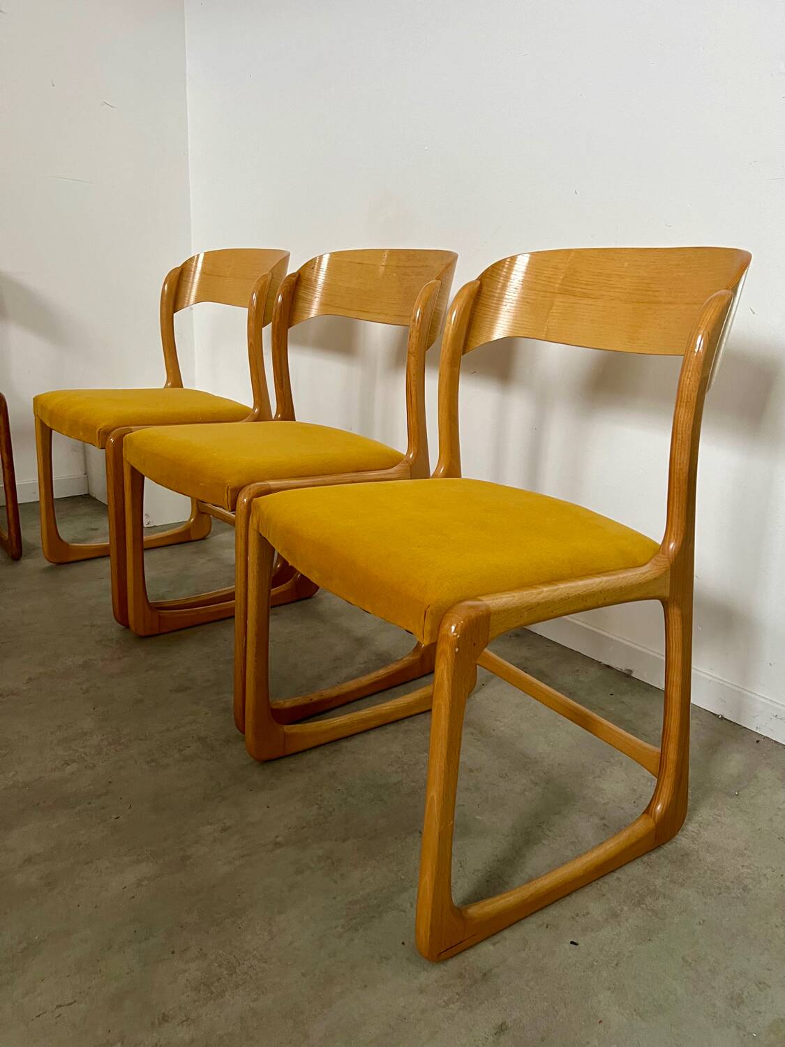 Set of 7 Baumann sled chairs in wood and mustard yellow fabric, 1960s