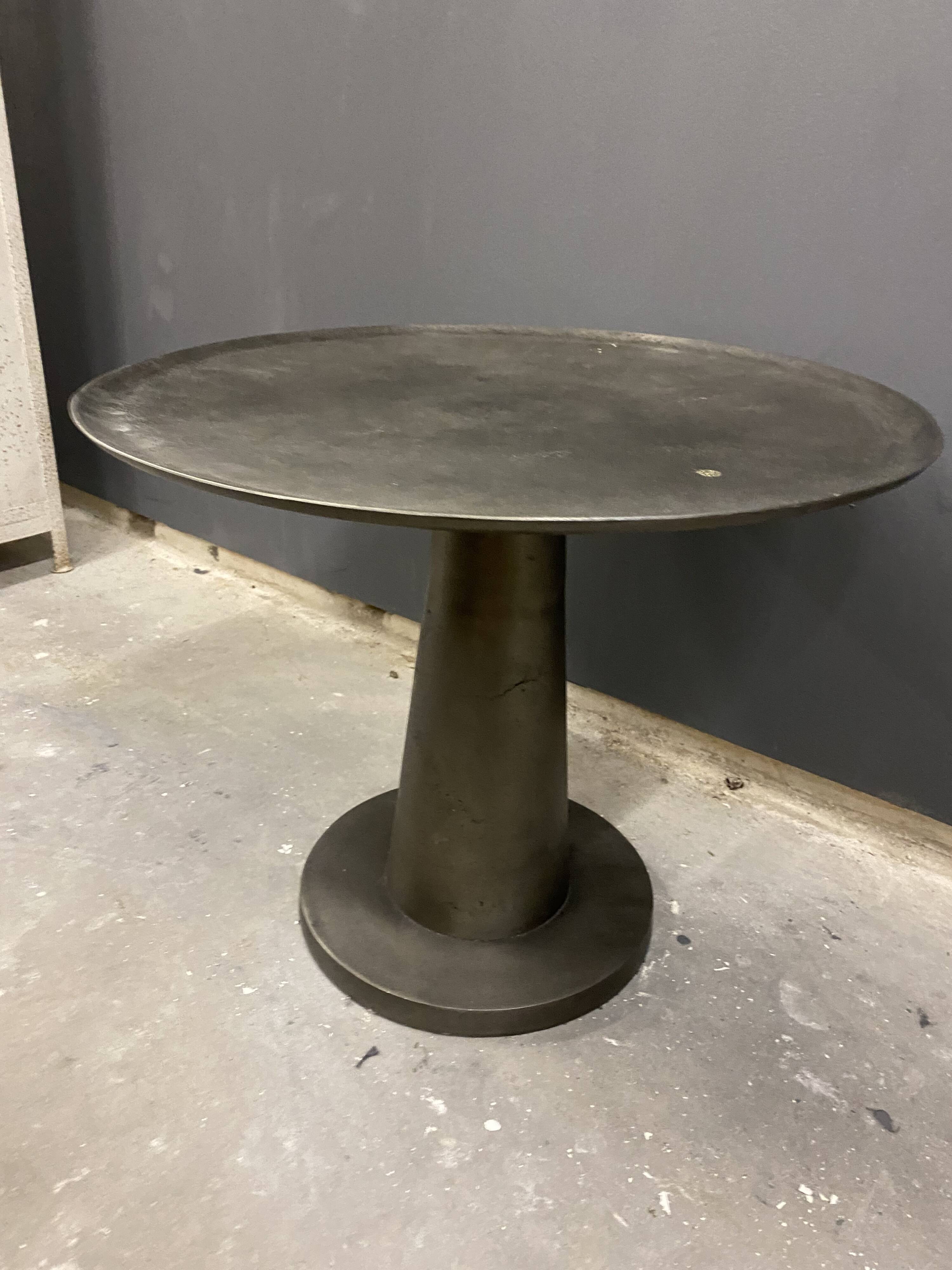 Industrial grey metal round table
