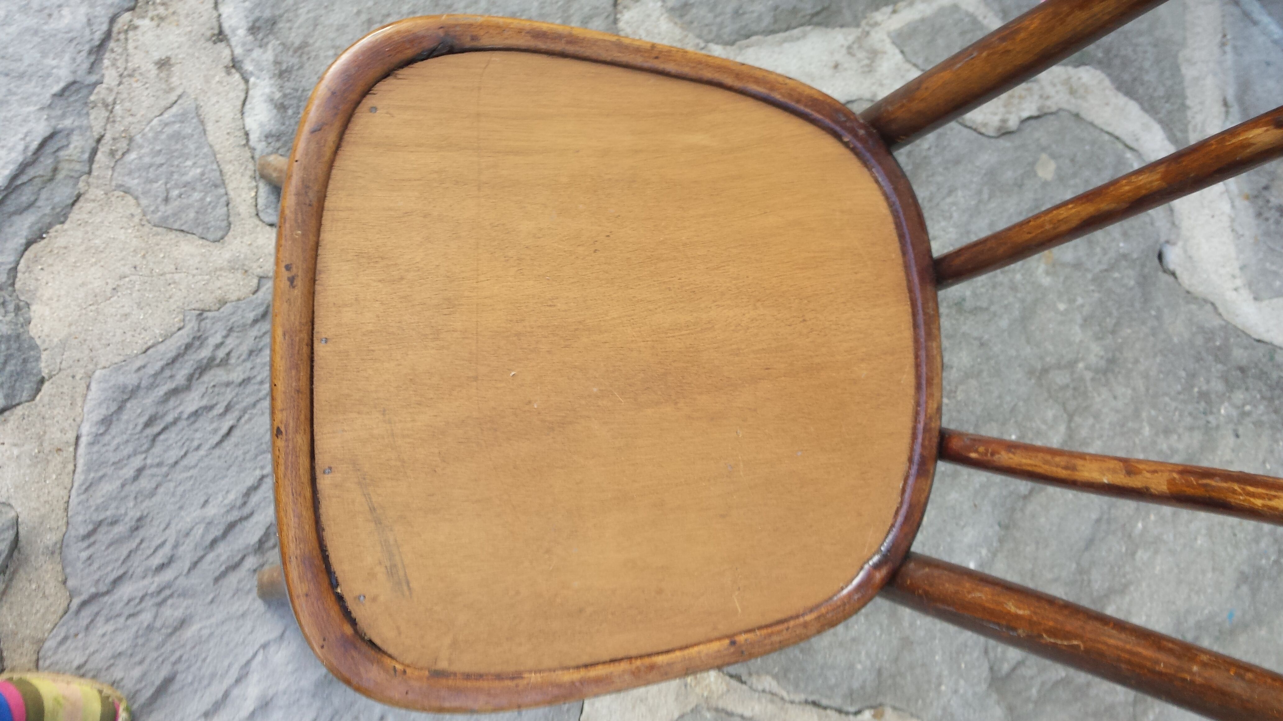 Bistro chair with buchon brand plate