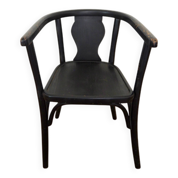 Curved black lacquered wooden armchair in Thonet style