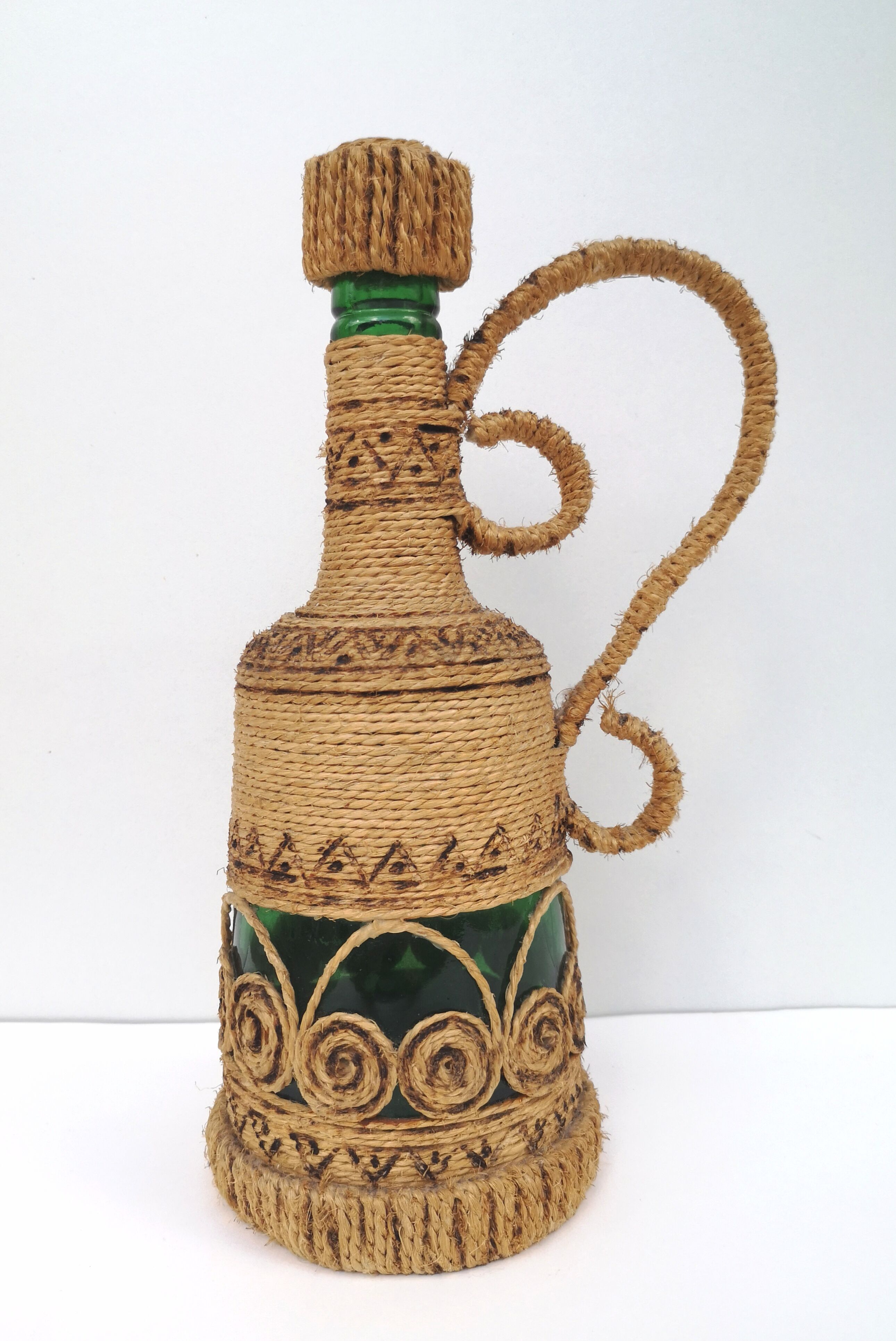 Vintage decorative rope bottle