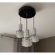 Cascading suspension and Raak Space Age 70 style wall lamps