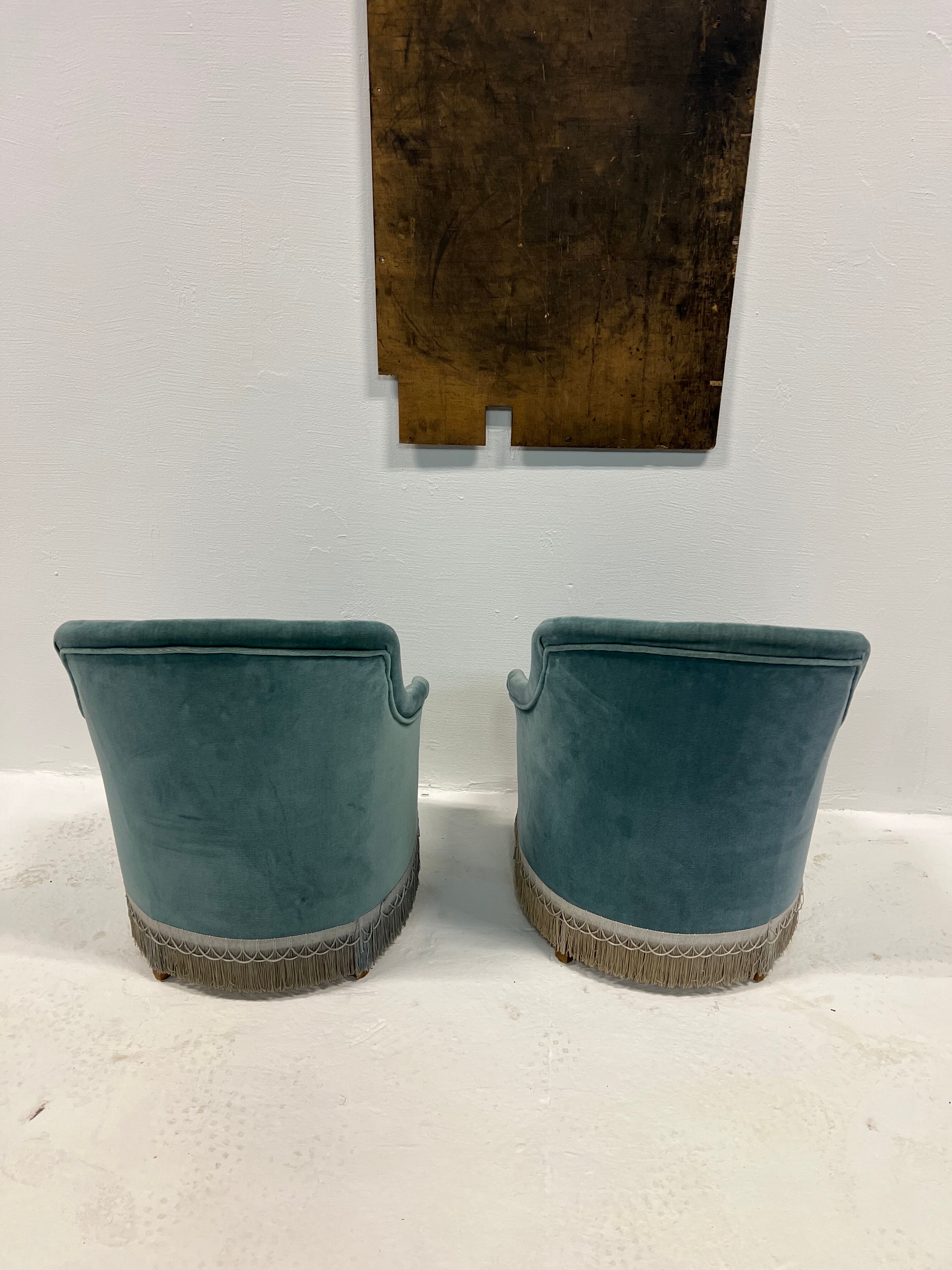 Duo of upholstered blue toad armchairs